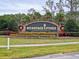 Heritage Pines Active 55+ Country Club Living community entrance sign at 18049 Tarrington Pl, Hudson, FL 34667