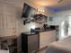 Bedroom with kitchenette, mini-fridge, and TV at 21103 Patio View Ct # 3105, Lutz, FL 33558