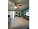 King-size bed in bright bedroom with kitchenette access at 21103 Patio View Ct # 3105, Lutz, FL 33558