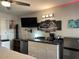 Bedroom with kitchenette, TV, and mini-fridge at 21103 Patio View Ct # 3105, Lutz, FL 33558
