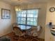 Small dining area with round table and chairs at 21103 Patio View Ct # 3105, Lutz, FL 33558