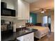Small kitchen with microwave, sink, and cabinets at 21103 Patio View Ct # 3105, Lutz, FL 33558