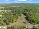 Aerial view of property showing expansive land at 23051 Lake Lindsey Rd, Brooksville, FL 34601