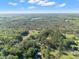 Aerial view of property showing expansive land at 23051 Lake Lindsey Rd, Brooksville, FL 34601