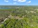 Aerial view of property showing expansive land at 23051 Lake Lindsey Rd, Brooksville, FL 34601