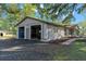 Attached garage with paved pathway, and room for vehicles at 23051 Lake Lindsey Rd, Brooksville, FL 34601