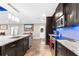 Modern kitchen with stainless steel appliances and granite countertops at 23051 Lake Lindsey Rd, Brooksville, FL 34601