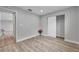 Bright bedroom with wood-look floors and ample closet space at 2643 Narcissus Dr, Holiday, FL 34691