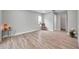 Spacious bedroom with wood-look floors and natural light at 2643 Narcissus Dr, Holiday, FL 34691