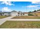Recently updated home exterior, showcasing a clean modern look at 2643 Narcissus Dr, Holiday, FL 34691