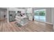 Modern kitchen with island and stainless steel appliances at 2643 Narcissus Dr, Holiday, FL 34691