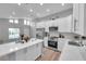 Spacious kitchen featuring white cabinets and quartz countertops at 2643 Narcissus Dr, Holiday, FL 34691