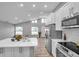 Bright kitchen with stainless steel appliances and island at 2643 Narcissus Dr, Holiday, FL 34691