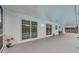 Covered patio overlooking the pool, perfect for relaxation at 2643 Narcissus Dr, Holiday, FL 34691