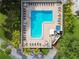 L shaped pool with plenty of lounge chairs at 2700 Bayshore Blvd # 3108, Dunedin, FL 34698