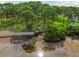 Aerial view of waterfront property with kayaks at 2700 Bayshore Blvd # 3108, Dunedin, FL 34698