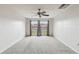 Spacious bedroom with large window and carpet at 2700 Bayshore Blvd # 3108, Dunedin, FL 34698