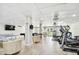 Community room with fitness equipment and games at 2700 Bayshore Blvd # 3108, Dunedin, FL 34698
