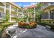 Attractive courtyard with fountain and landscaping at 2700 Bayshore Blvd # 3108, Dunedin, FL 34698