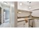 Updated kitchen with stainless steel appliances and white cabinets at 2700 Bayshore Blvd # 3108, Dunedin, FL 34698