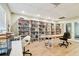 Well-lit library with books, games, and workspaces at 2700 Bayshore Blvd # 3108, Dunedin, FL 34698