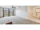Living room with carpet, ceiling fan, and view of kitchen at 2700 Bayshore Blvd # 3108, Dunedin, FL 34698