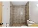 Large walk-in shower with tiled walls at 2700 Bayshore Blvd # 3108, Dunedin, FL 34698