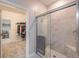 Spacious shower with glass enclosure and tiled walls at 31565 Cannon Rush Dr, San Antonio, FL 33576