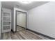 Empty bedroom with mirrored closet and modern door at 405 Pine S Ave, Oldsmar, FL 34677