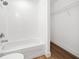 Bathroom with shower/tub combo and built-in shelving at 4067 Monona Ave, Spring Hill, FL 34606