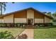 Community clubhouse with landscaped grounds at 4426 Pelorus Dr # 4426, New Port Richey, FL 34652