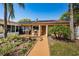 Outdoor grilling area with patio and lush landscaping at 4426 Pelorus Dr # 4426, New Port Richey, FL 34652