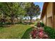 Landscaped walkway leading to community amenities at 4426 Pelorus Dr # 4426, New Port Richey, FL 34652