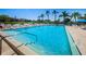 Inviting community pool with lounge chairs at 4426 Pelorus Dr # 4426, New Port Richey, FL 34652