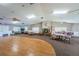 Spacious community room with hardwood floors and fireplace at 4426 Pelorus Dr # 4426, New Port Richey, FL 34652