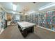 Community library with ample bookshelves and pool table at 4426 Pelorus Dr # 4426, New Port Richey, FL 34652