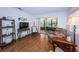 Living room with TV, seating and wood floors at 4426 Pelorus Dr # 4426, New Port Richey, FL 34652