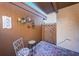Small patio with seating and coastal decor at 4426 Pelorus Dr # 4426, New Port Richey, FL 34652