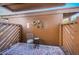 Small patio with decorative wall art and seating at 4426 Pelorus Dr # 4426, New Port Richey, FL 34652