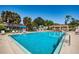 Refreshing community pool with ample deck space for lounging at 4426 Pelorus Dr # 4426, New Port Richey, FL 34652