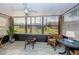 Sunroom with seating and access to backyard at 4426 Pelorus Dr # 4426, New Port Richey, FL 34652