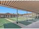 Enjoy recreational shuffleboard courts under covered area at 4515 Marine Pkwy # 102, New Port Richey, FL 34652