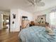 Serene bedroom with a view of another room and plenty of light at 4912 Enfield Ct, New Port Richey, FL 34655