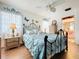 Comfortable bedroom with a charming metal bed frame at 4912 Enfield Ct, New Port Richey, FL 34655