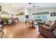 Open living and dining area with hardwood floors and lots of light at 4912 Enfield Ct, New Port Richey, FL 34655