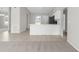 Modern kitchen with white cabinets and a large island at 5948 Lyon Rd, Spring Hill, FL 34606