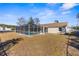 Screened-in pool with spacious backyard at 5948 Lyon Rd, Spring Hill, FL 34606
