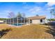 House with screened pool and fenced backyard at 5948 Lyon Rd, Spring Hill, FL 34606