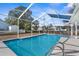 Refreshing pool surrounded by a fenced backyard at 5948 Lyon Rd, Spring Hill, FL 34606