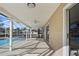 Covered patio overlooking the refreshing swimming pool at 5948 Lyon Rd, Spring Hill, FL 34606